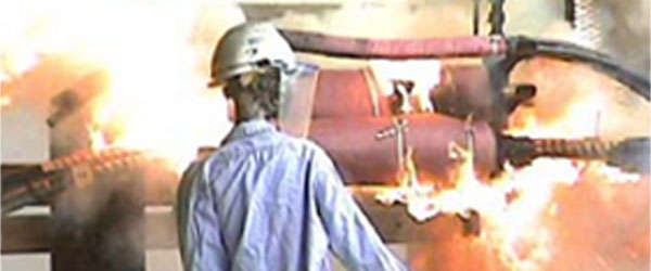 a man watching a fire safety demonstration